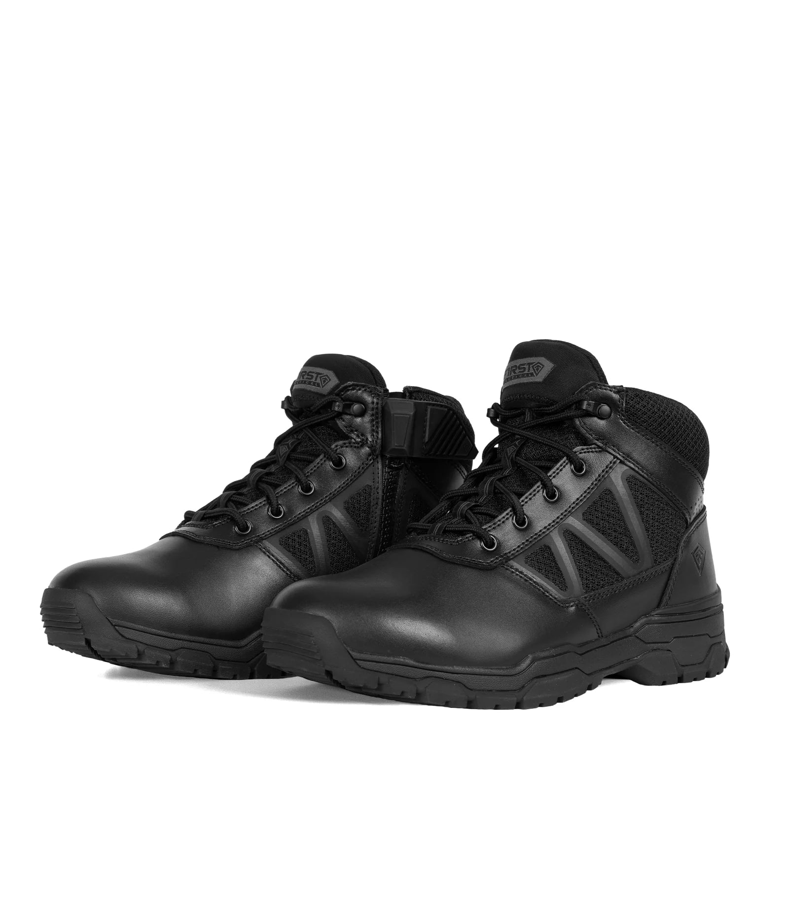 Pair of black tactical boots on a white background