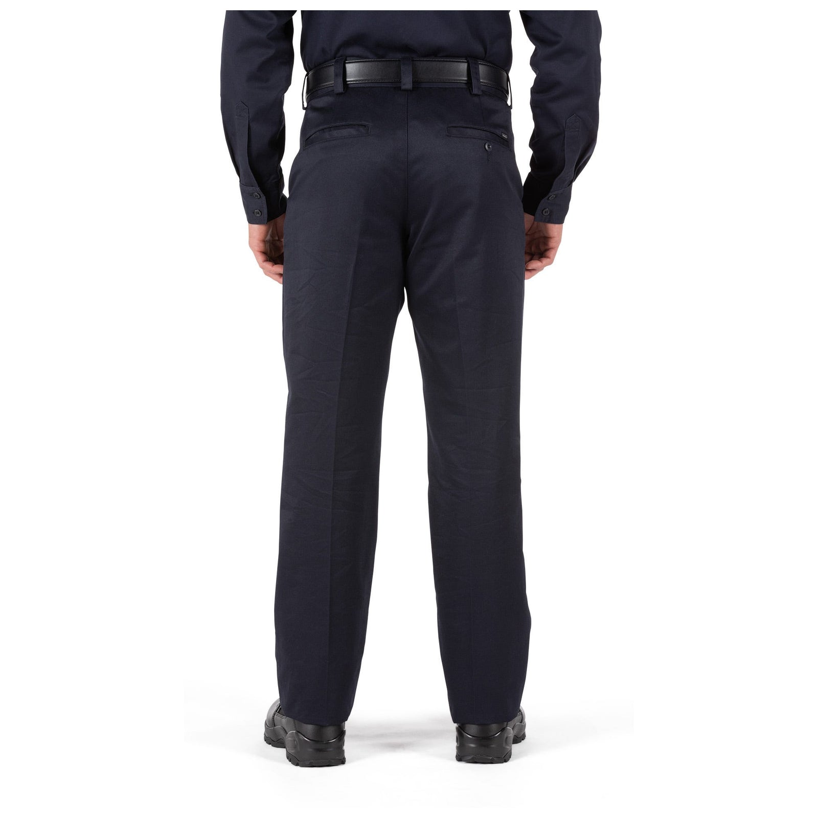 Person wearing navy blue pants on a white background