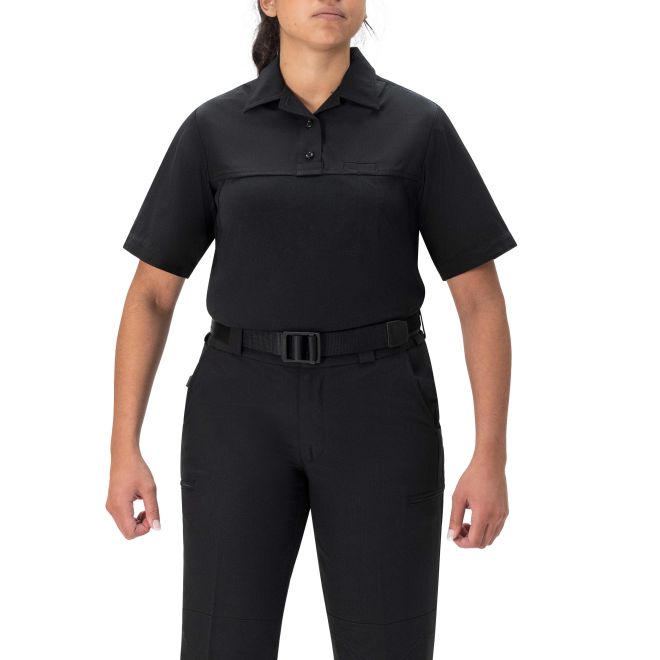Person wearing a black short-sleeve uniform with a belt on a white background