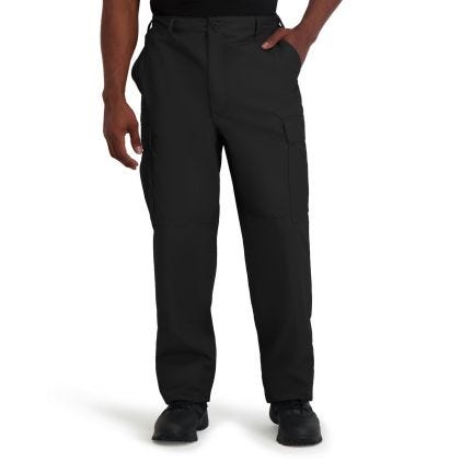 Black pants worn by a person on a white background