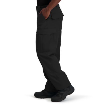 Black tactical pants worn by a person on a white background