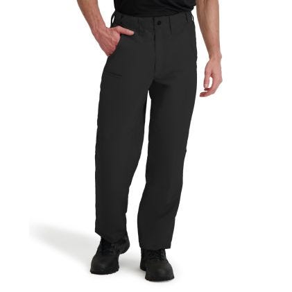 Navy pants worn by a person on a white background