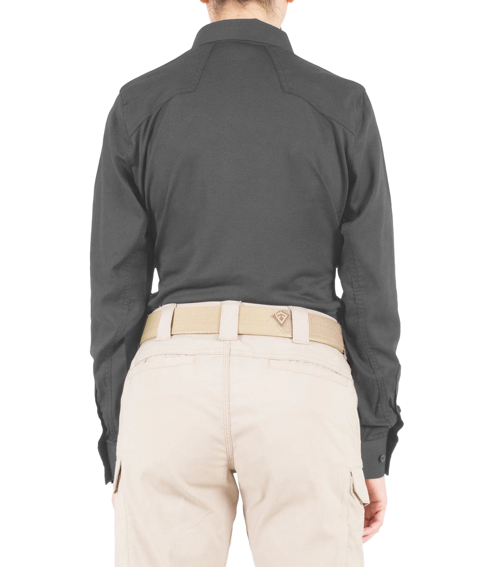 Person wearing a dark gray long-sleeve shirt and beige pants on a white background