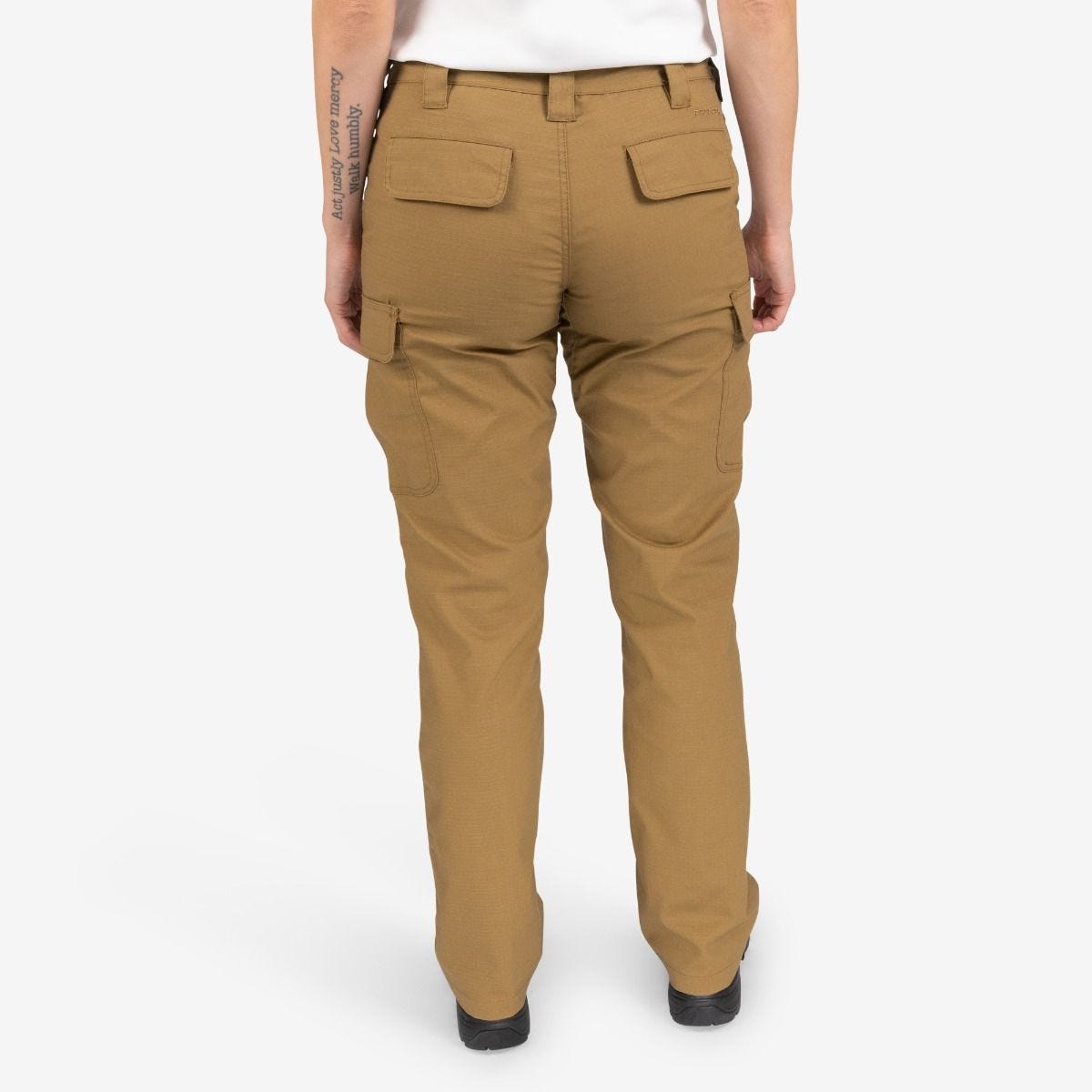 Tan cargo pants worn by a person on a white background