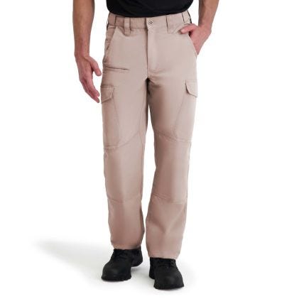 Beige tactical pants worn by a person on a white background