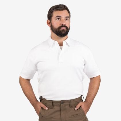 Man wearing a white shirt and brown pants on a white background