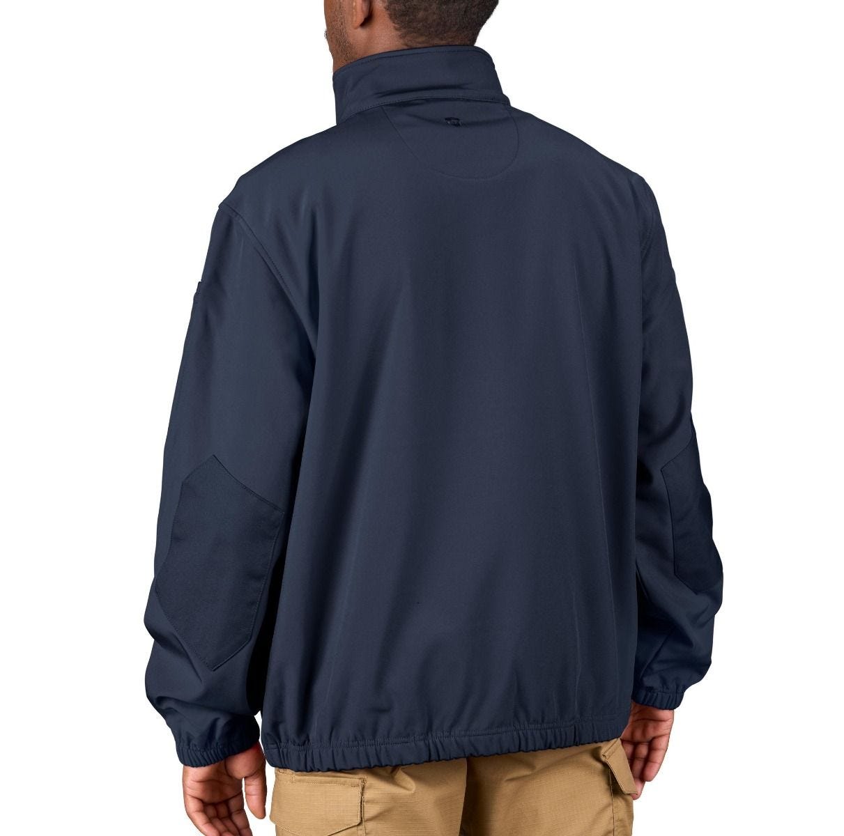 Navy blue jacket worn by a person on a white background