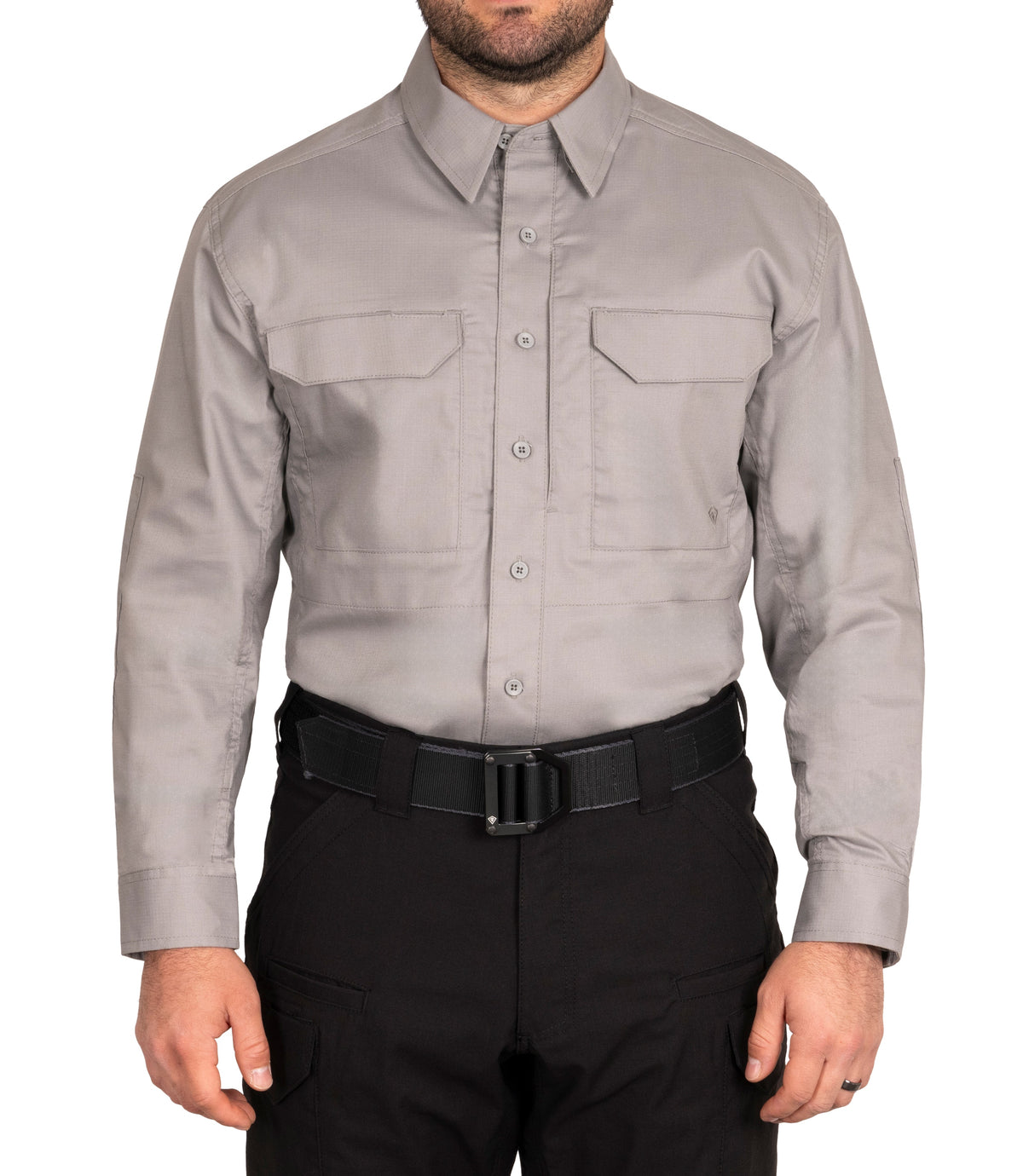 Person wearing a gray shirt and black pants on a white background