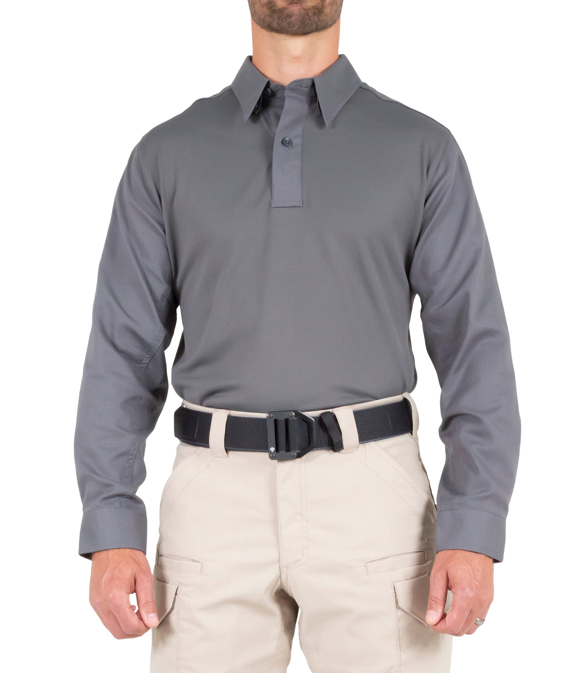 Man wearing a gray long-sleeve shirt and beige pants on a white background