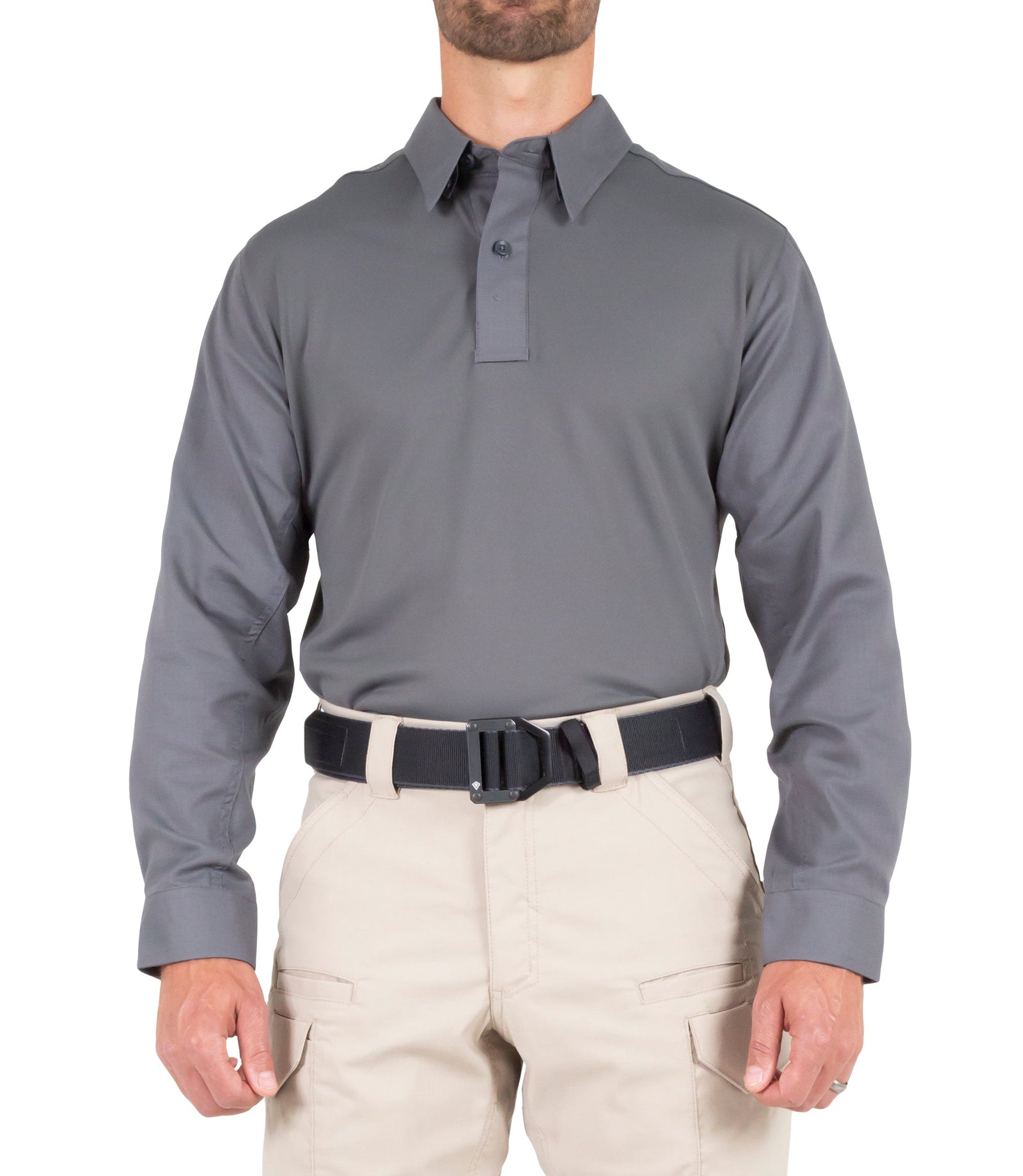 Man wearing a gray long-sleeve shirt and beige pants on a white background