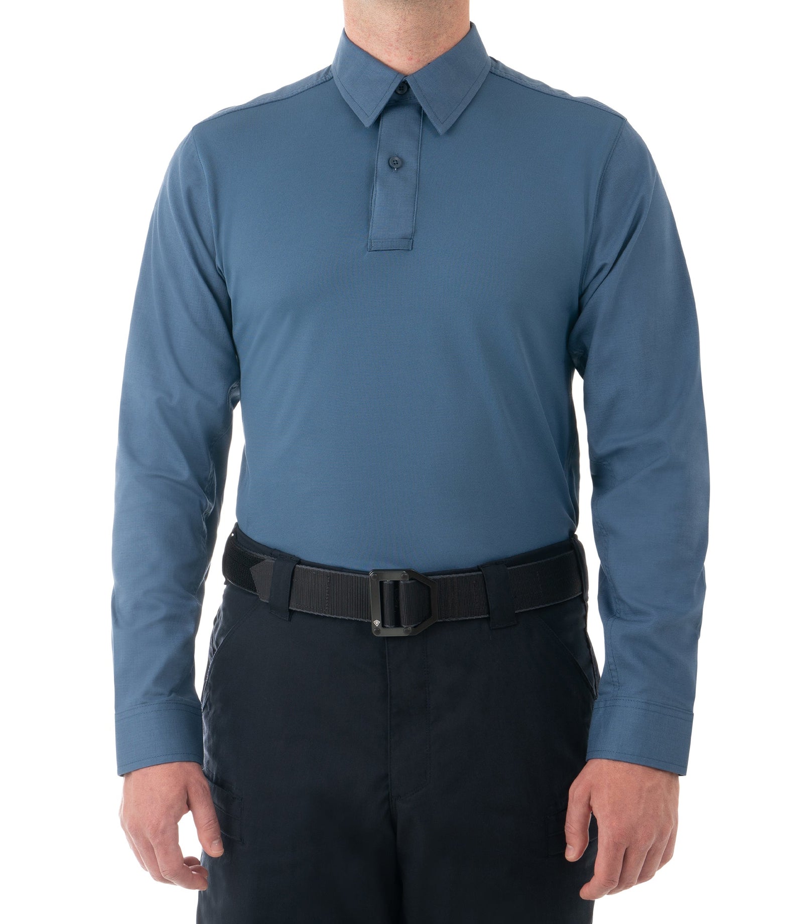 Person wearing a blue long-sleeve shirt and black pants on a white background