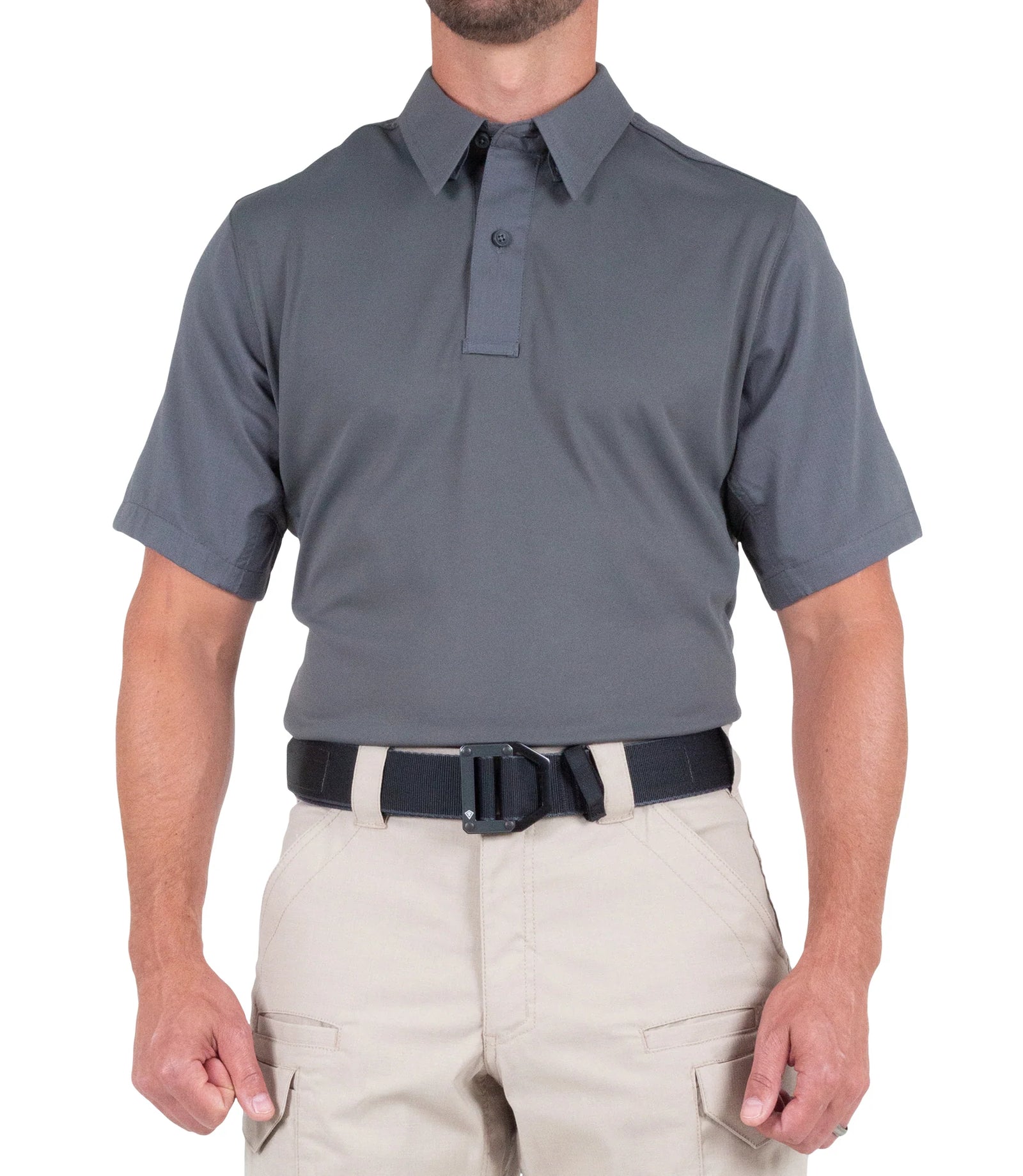 Person wearing a gray polo shirt and beige pants on a white background