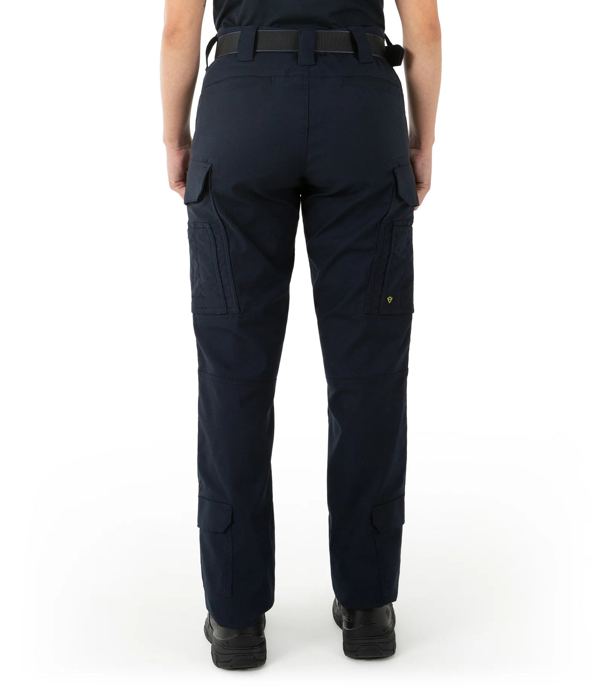 Navy blue tactical pants worn by a person on a white background