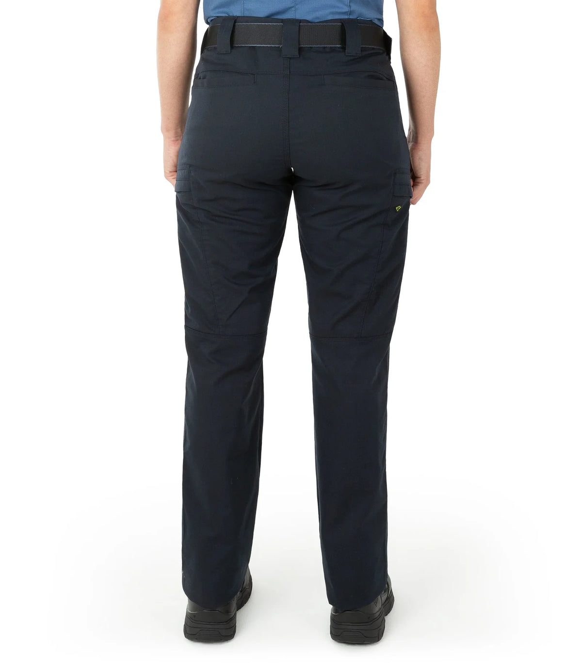 Person wearing navy blue pants on a white background