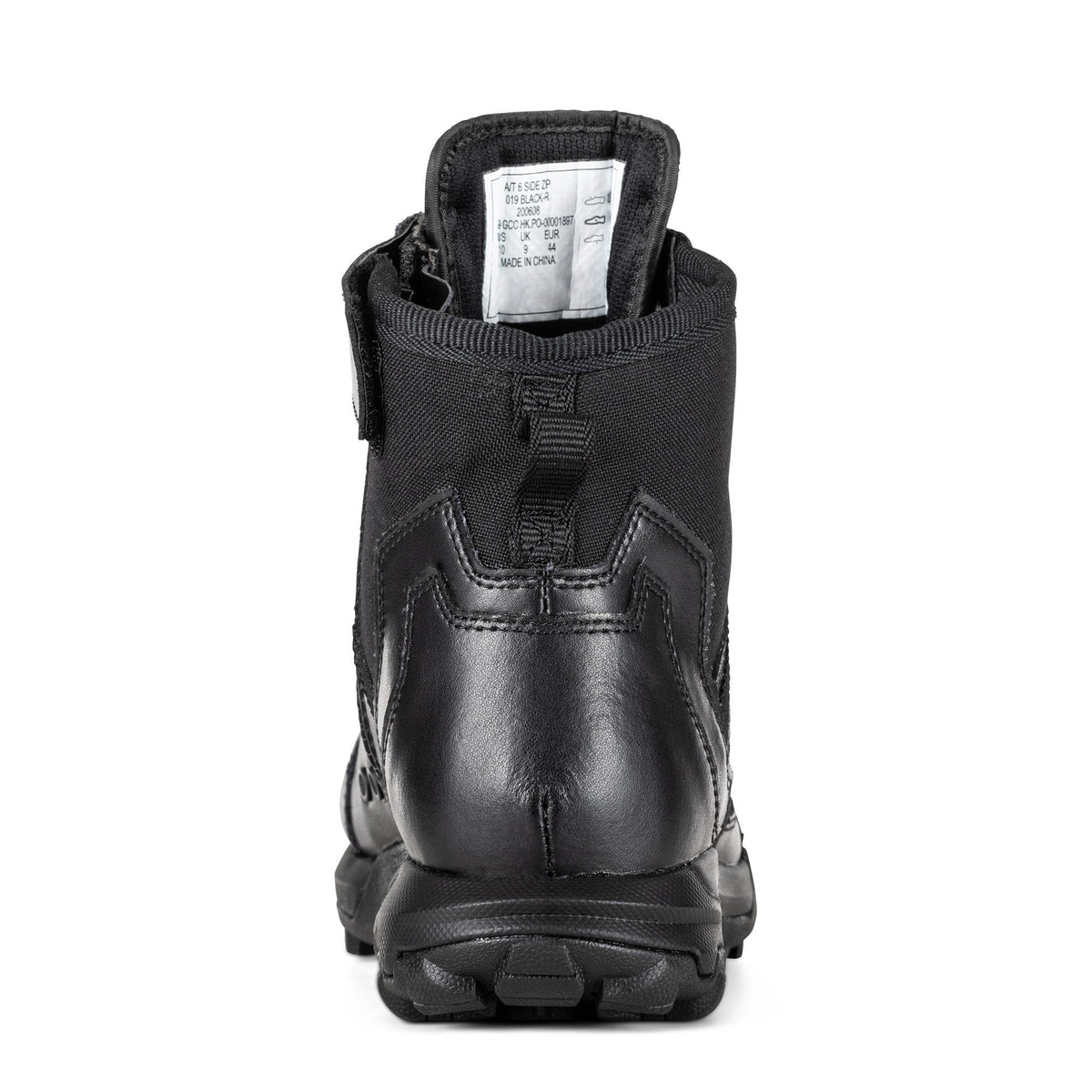 Black boot with visible sole on a white background