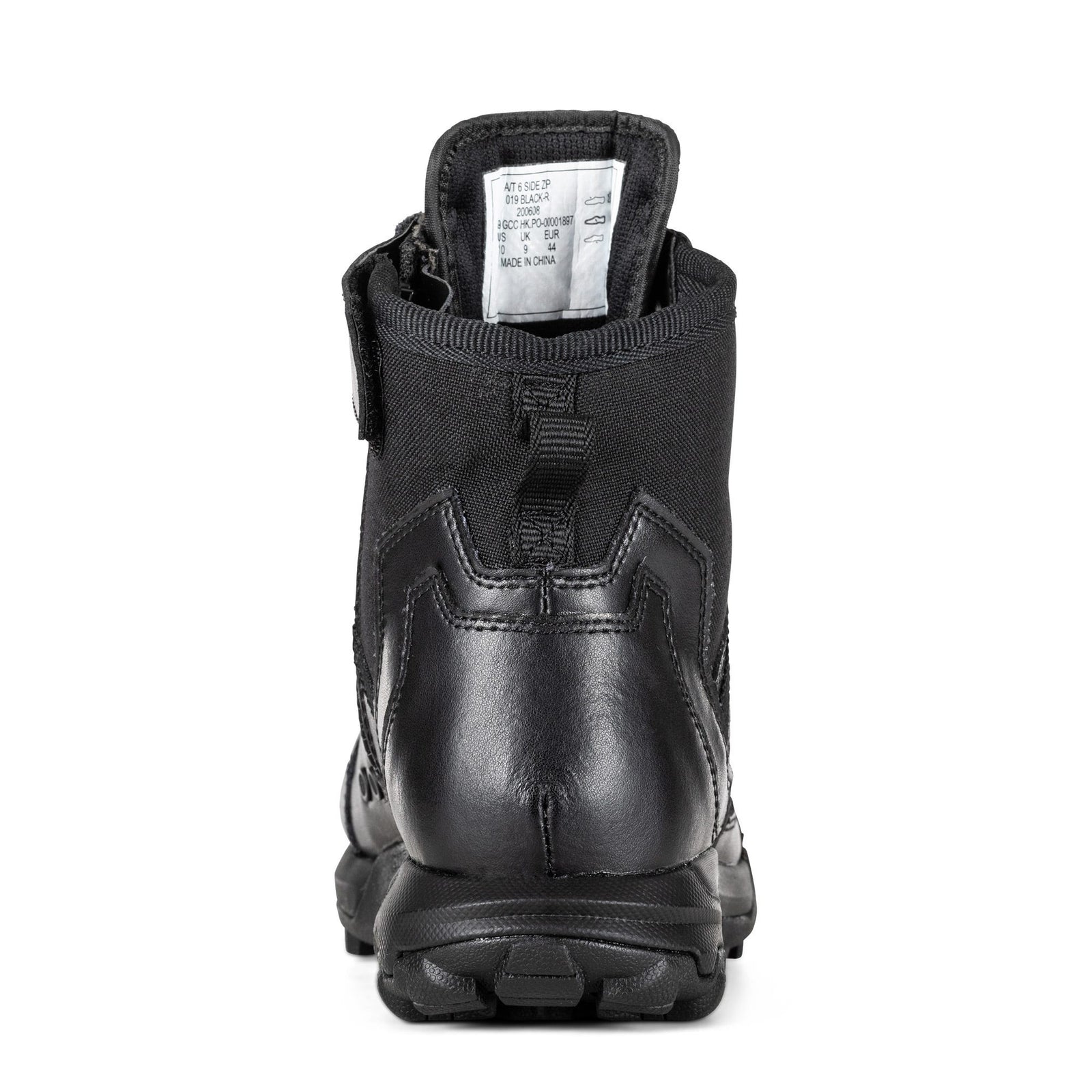 Black boot with visible sole on a white background