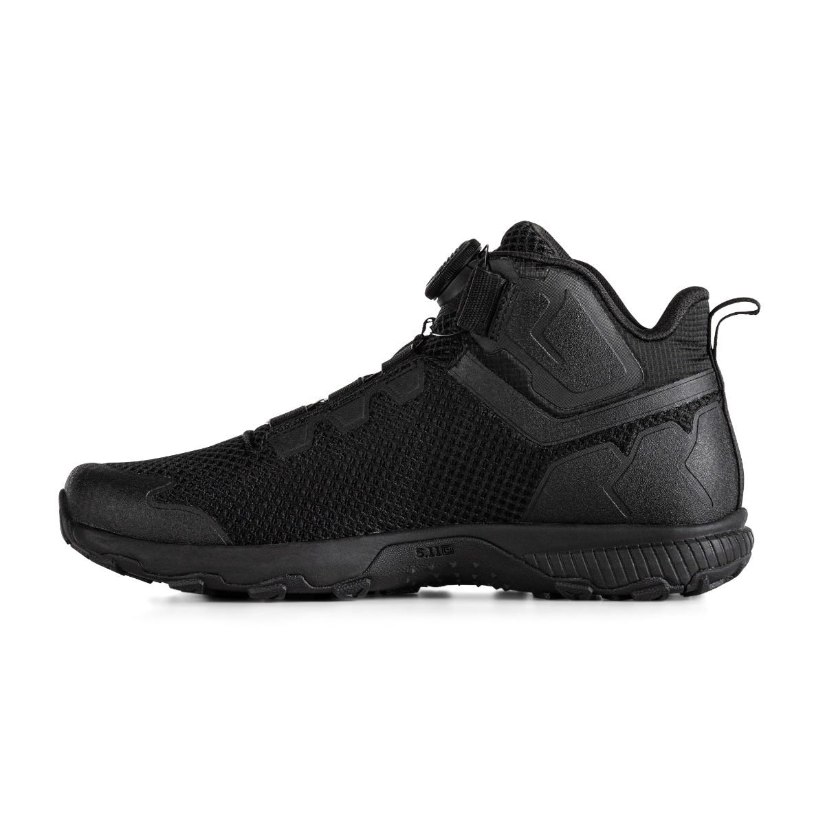 Brown hiking boot with a black sole on a white background