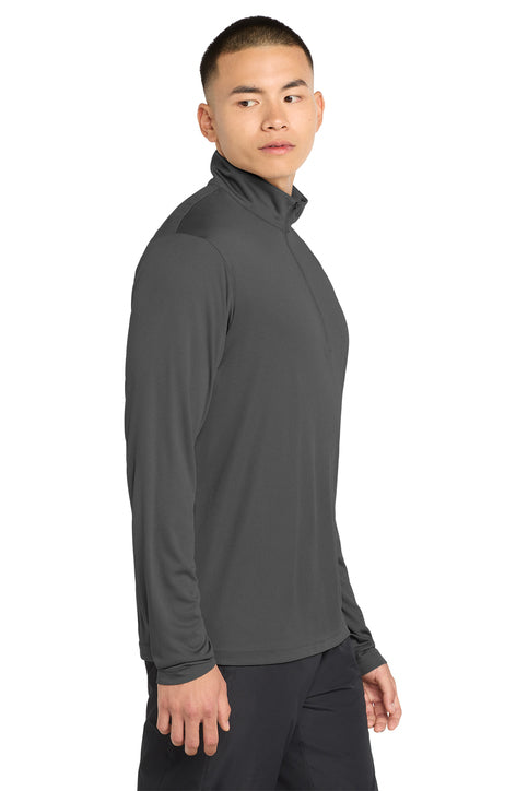 Man wearing a gray long-sleeve athletic shirt on a white background