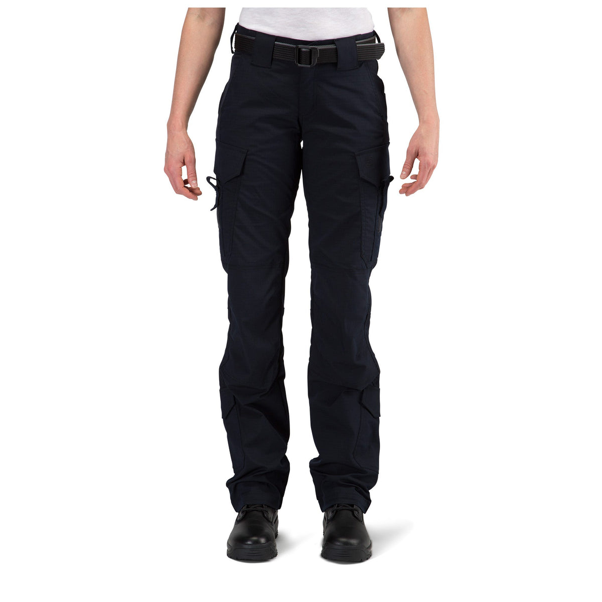 Black tactical pants worn by a person on a white background
