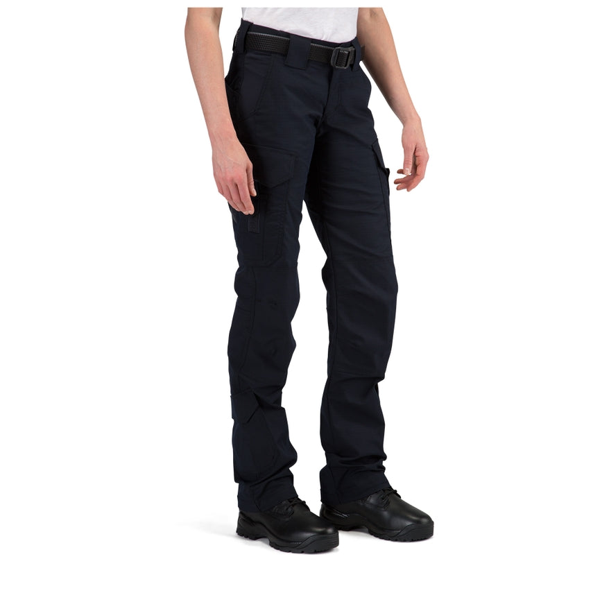 Person wearing black tactical pants on a white background