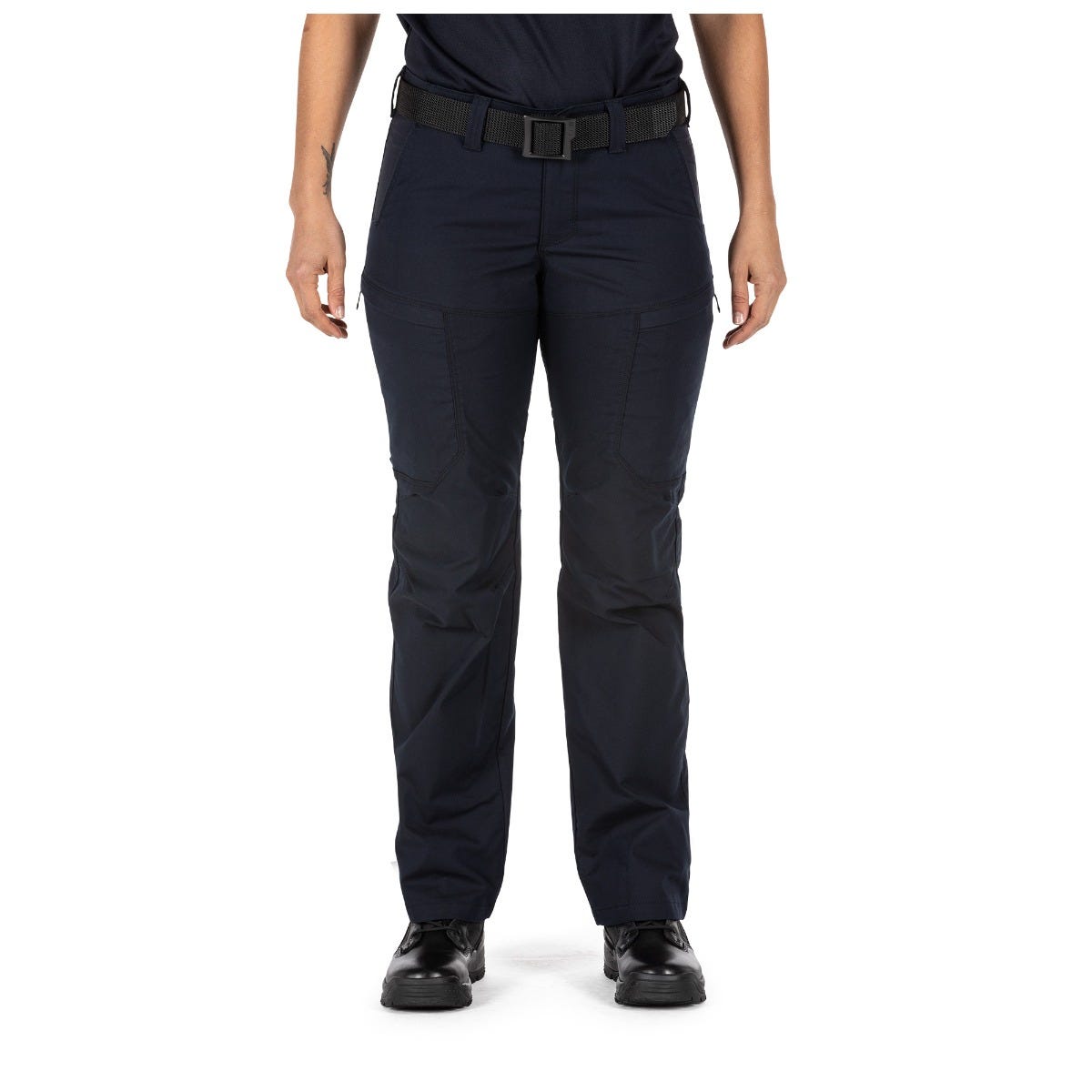 Person wearing black tactical pants on a white background
