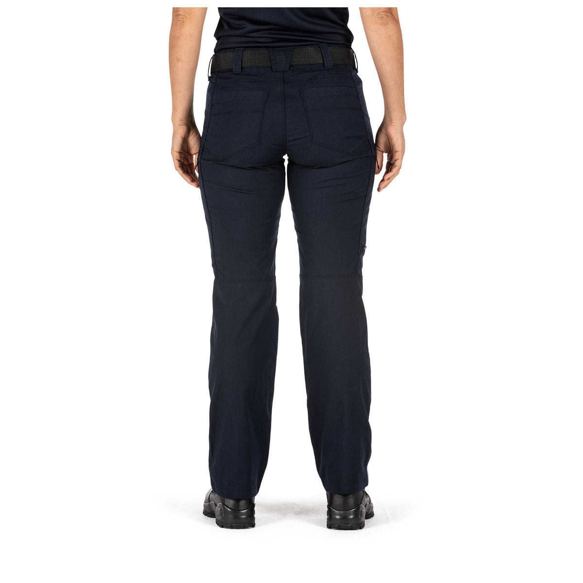 Person wearing navy blue pants on a white background