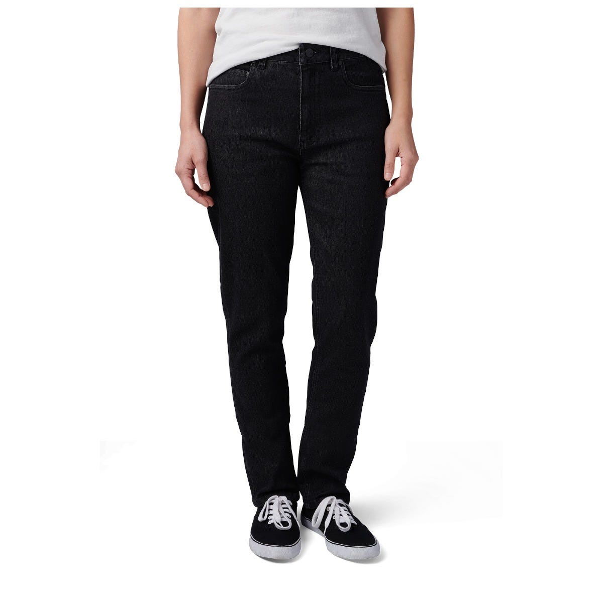 Person wearing black jeans and black sneakers on a white background