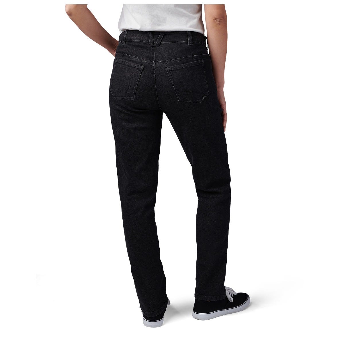 Person wearing black jeans on a white background
