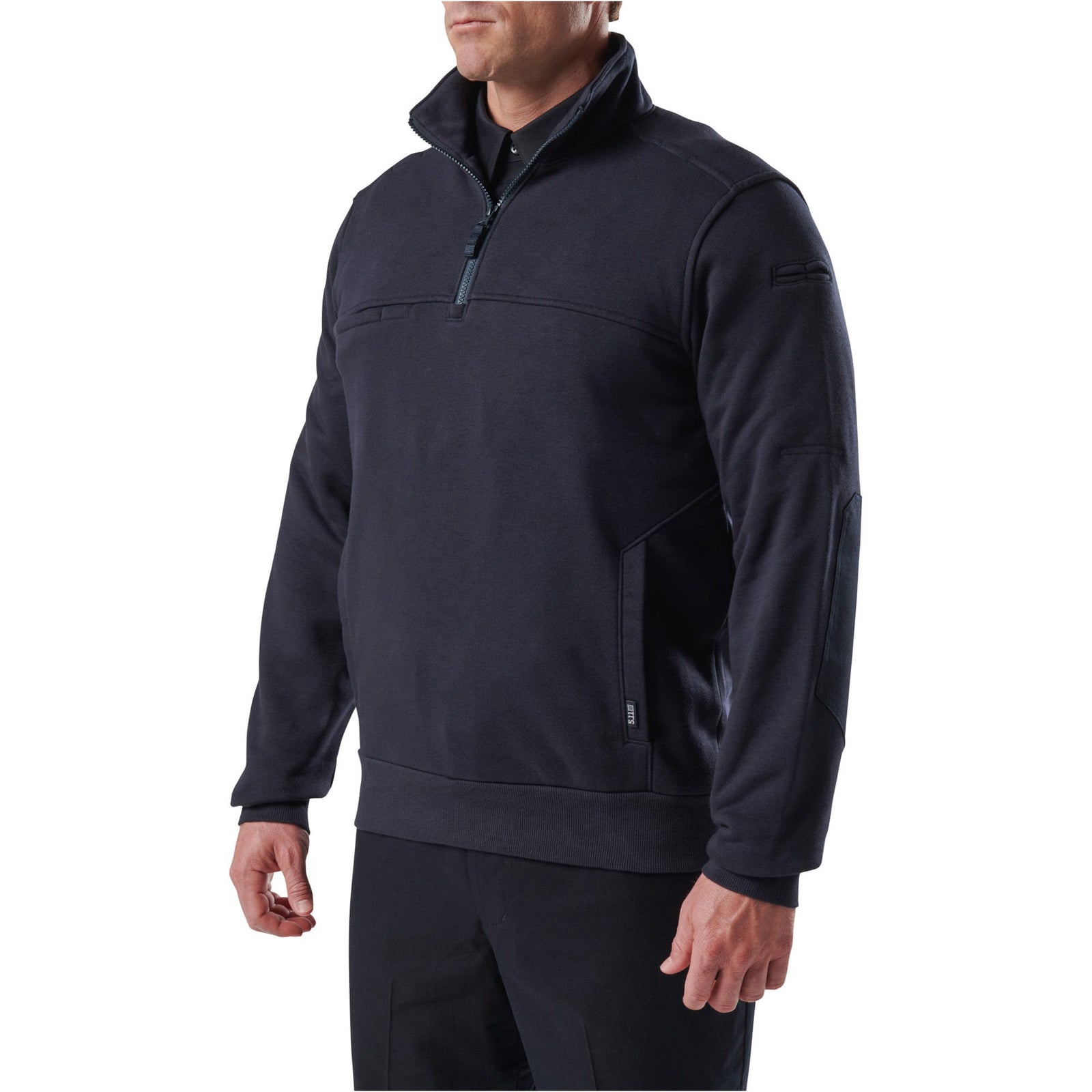 Man wearing a dark blue pullover with a zipper on a white background