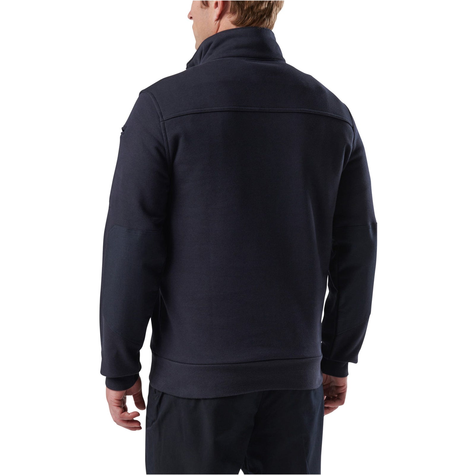 Person wearing a navy blue jacket on a white background