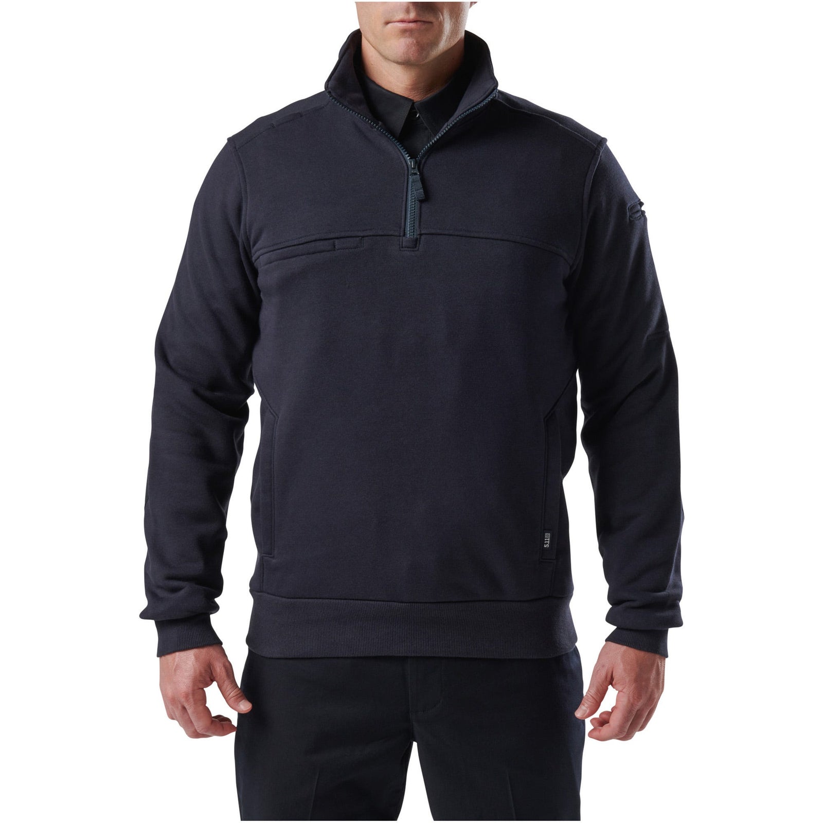 Man wearing a dark gray pullover with a quarter-zip design on a white background