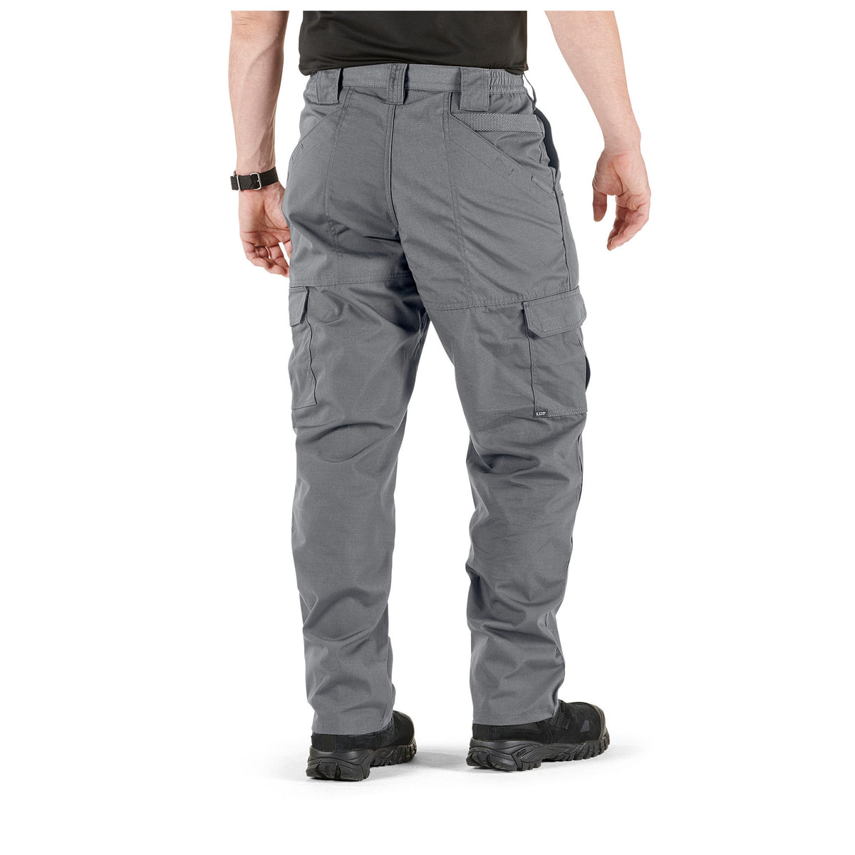 Person wearing tactical cargo pants