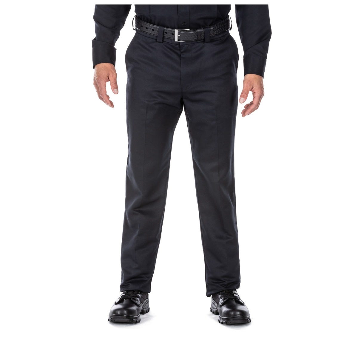 Black pants worn by a person on a white background