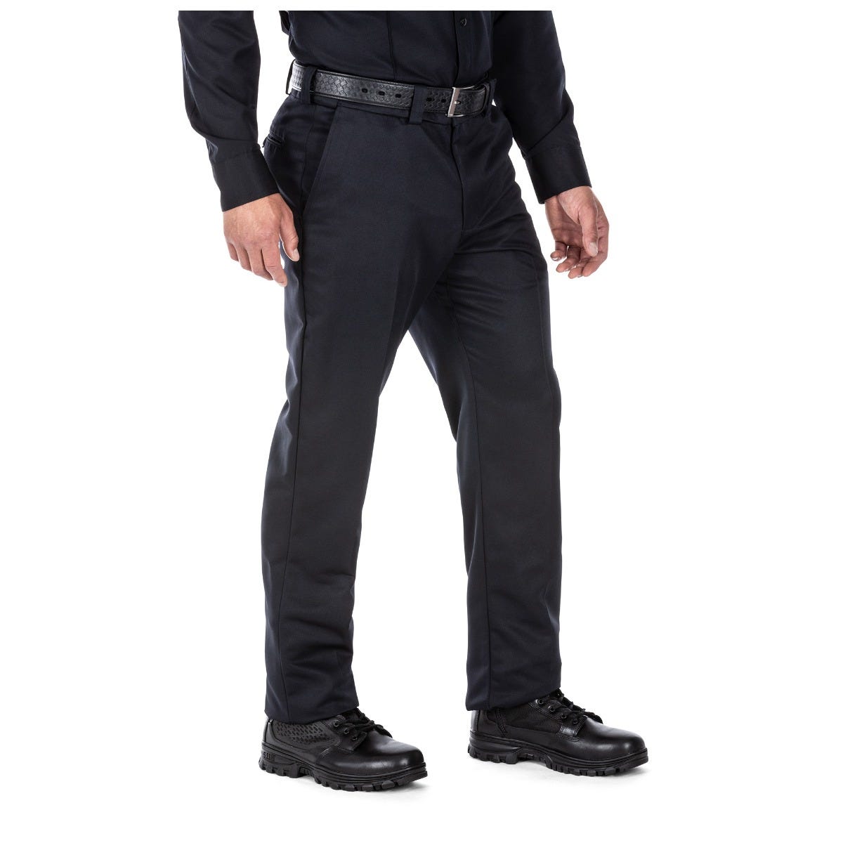 Person wearing black tactical pants on a white background