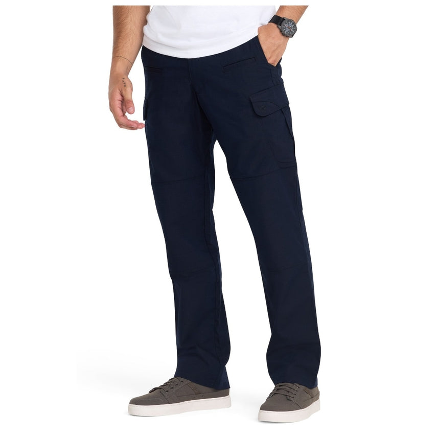 Person wearing navy pants on a white background