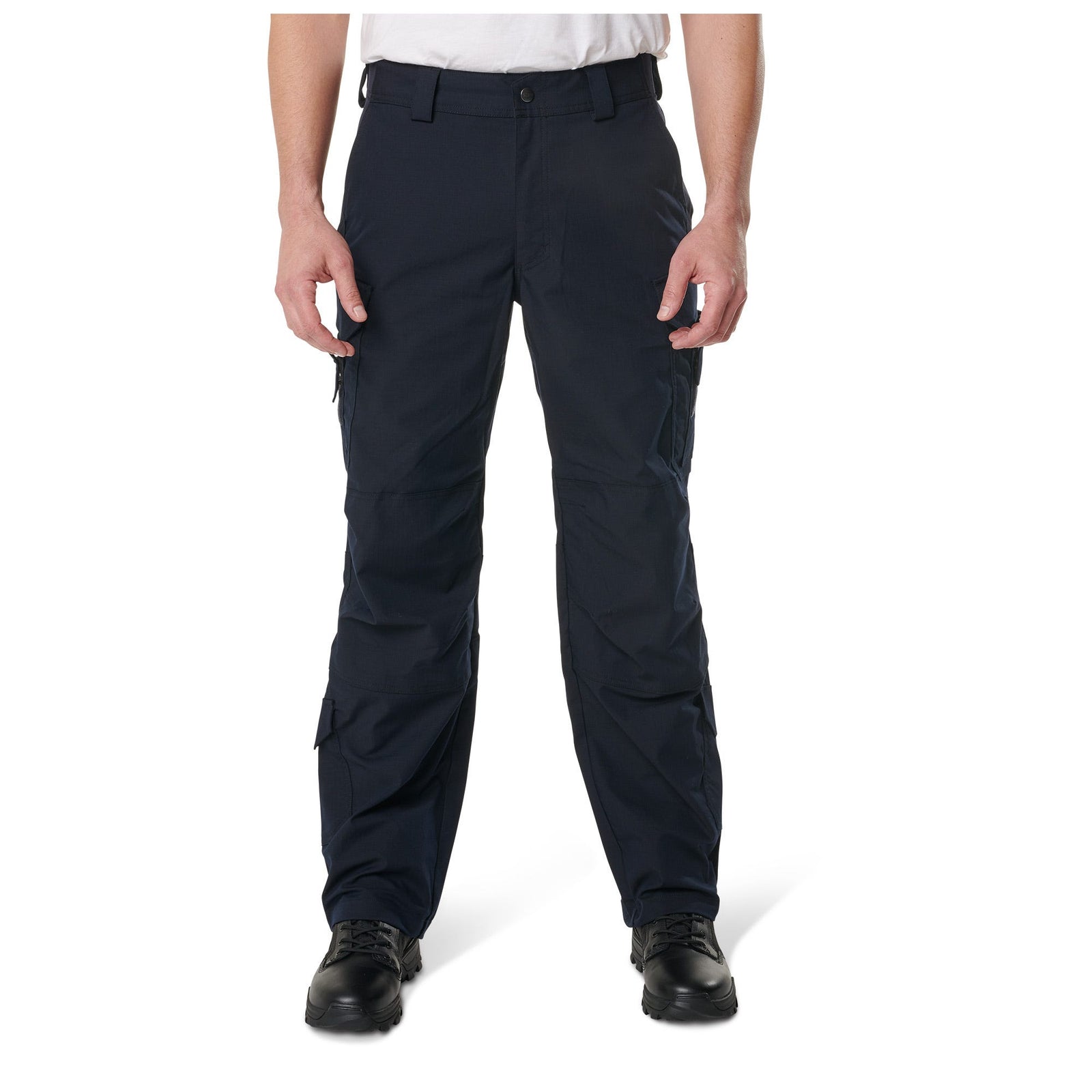 Person wearing black pants on a white background