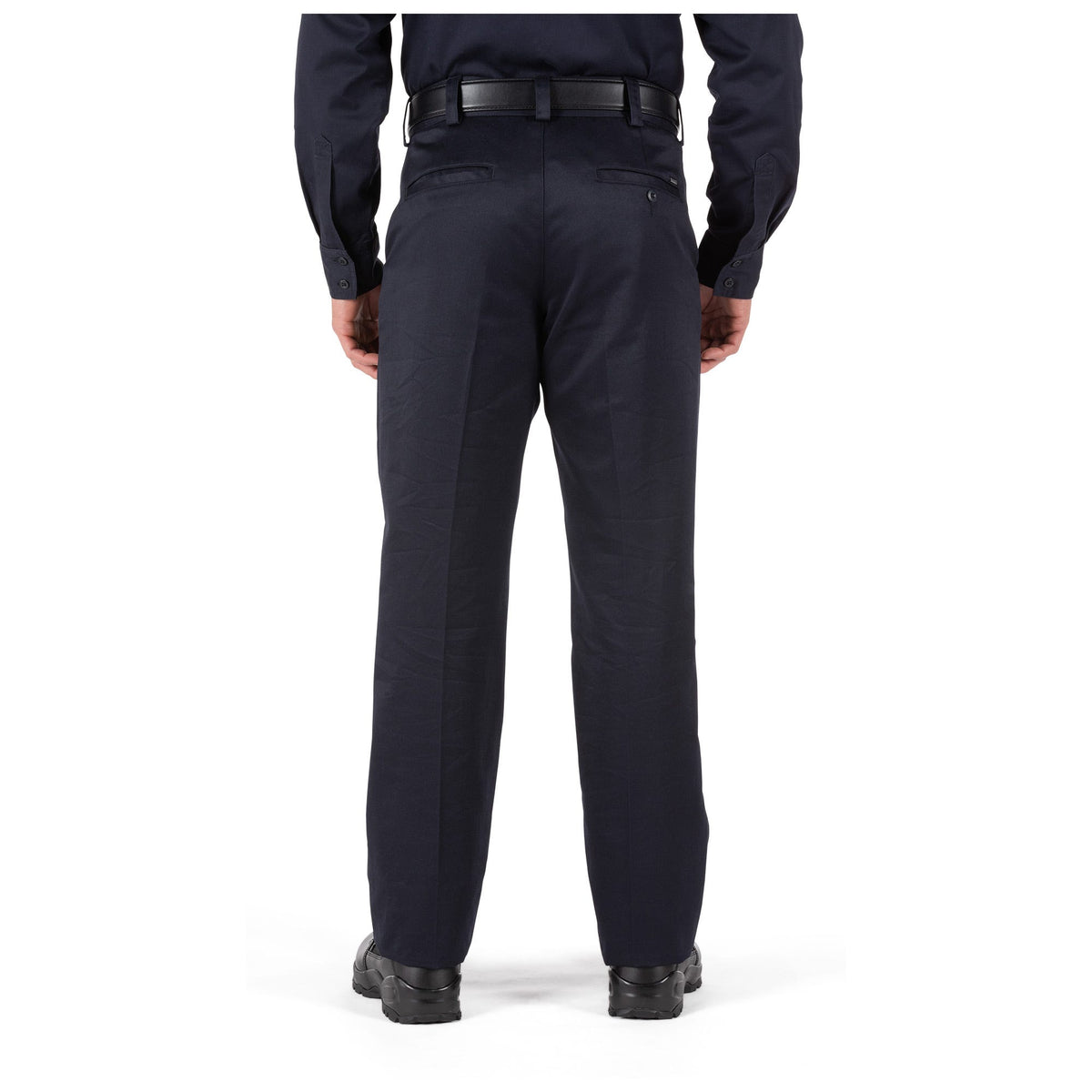 Person wearing navy blue pants on a white background