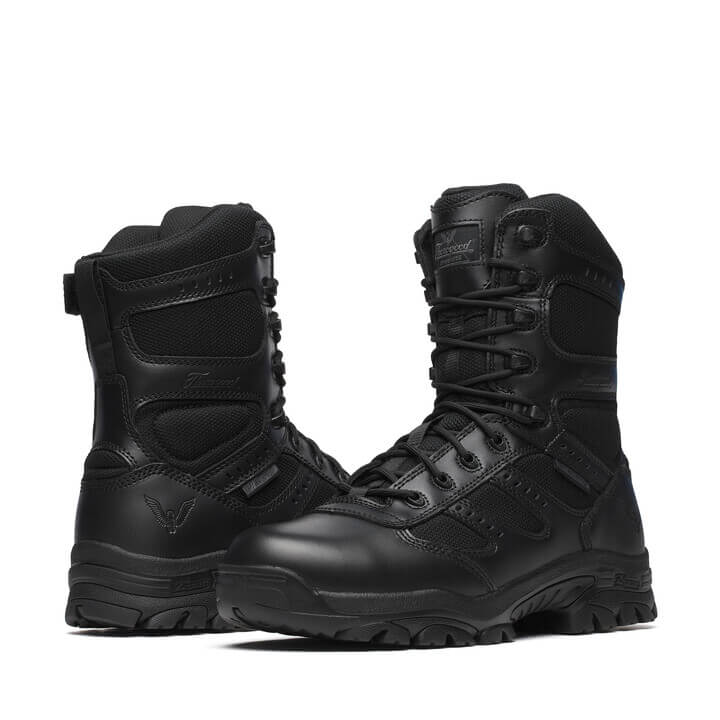 Pair of black tactical boots on a white background