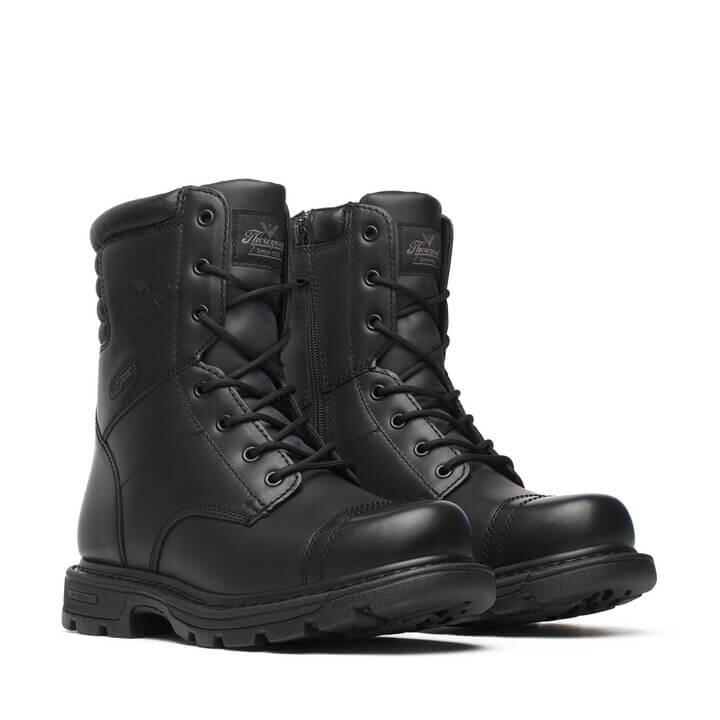 Pair of black boots on a white background