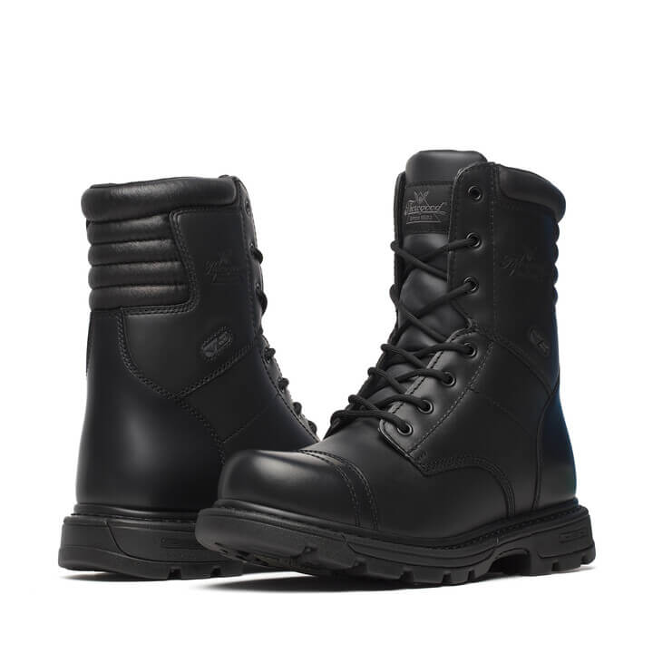 Pair of black boots on a white background