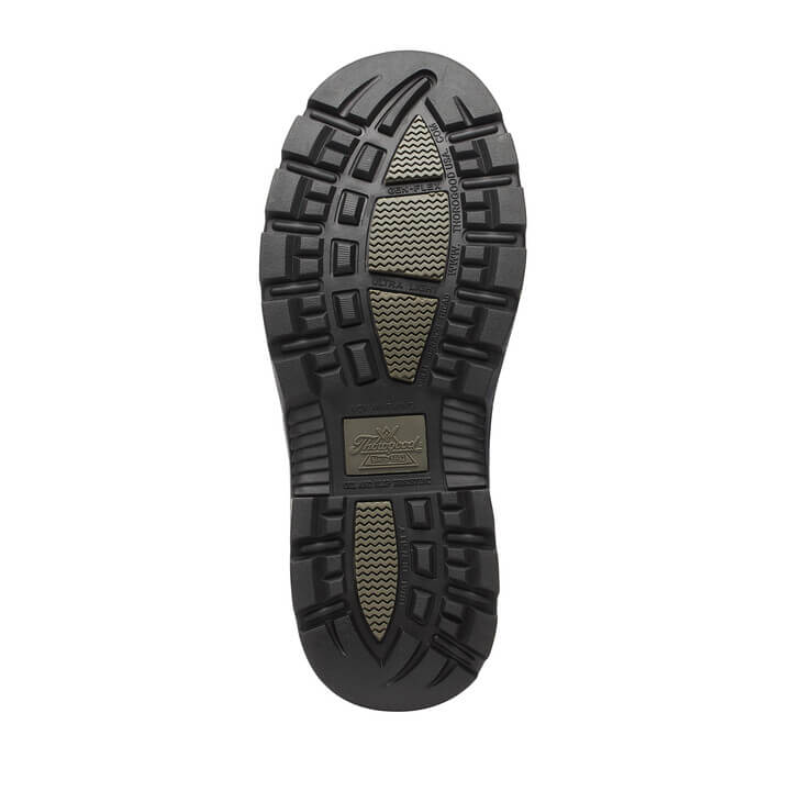 Close-up of a black shoe sole with tread pattern on a white background