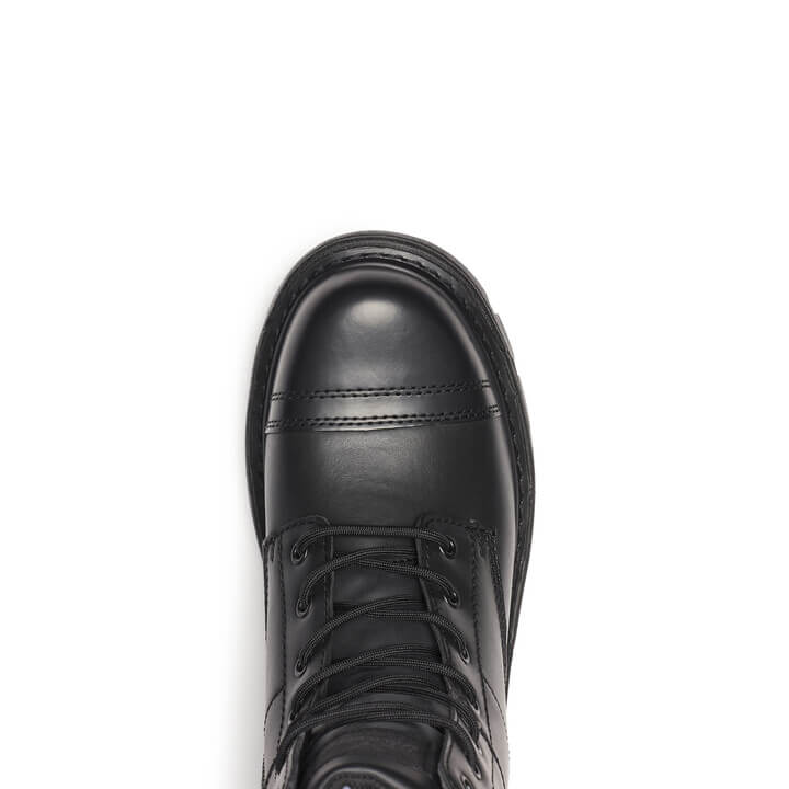 Black leather boot on a white background