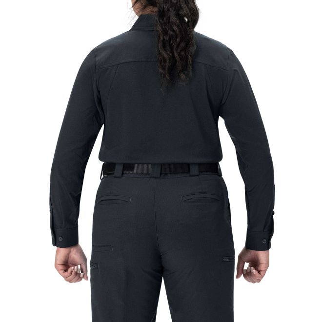 Person wearing a black long-sleeve shirt and pants on a white background