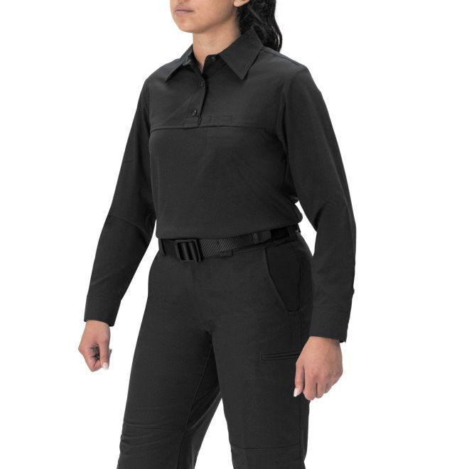 Person wearing a black long-sleeve shirt and pants on a white background