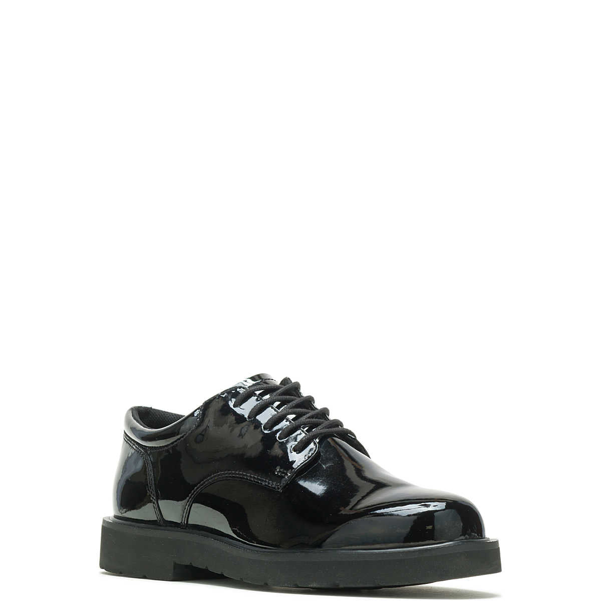 Black patent leather shoe on a white background