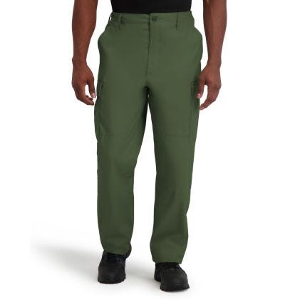 Green pants worn by a person on a white background