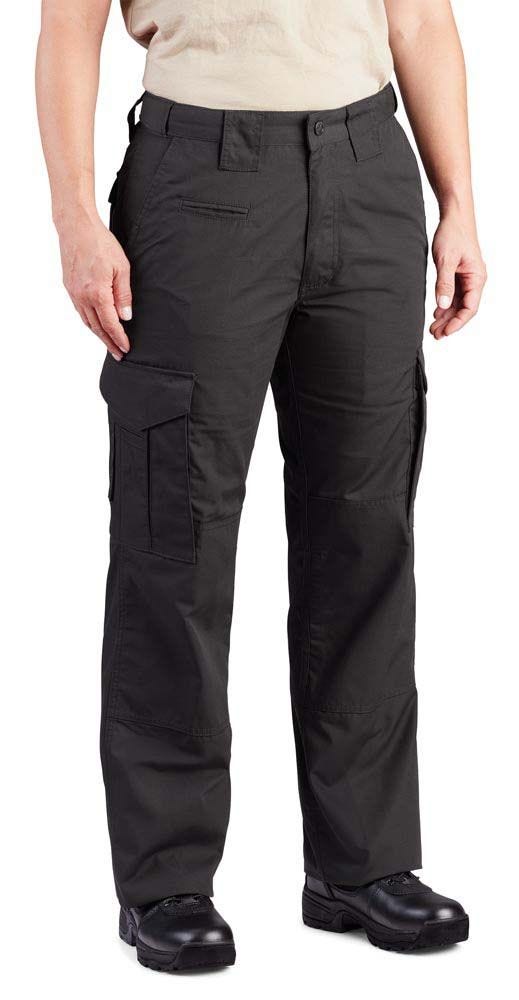 Person wearing black tactical pants on a white background