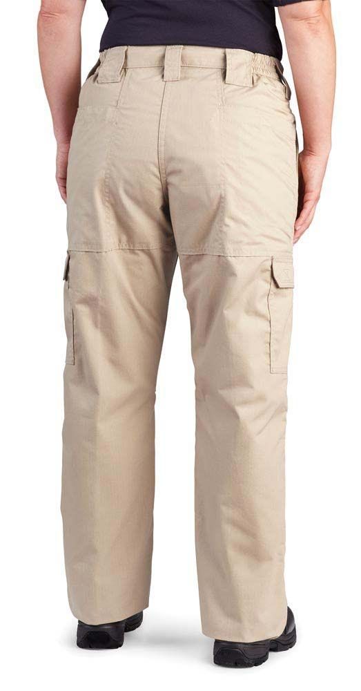 Beige pants worn by a person on a white background