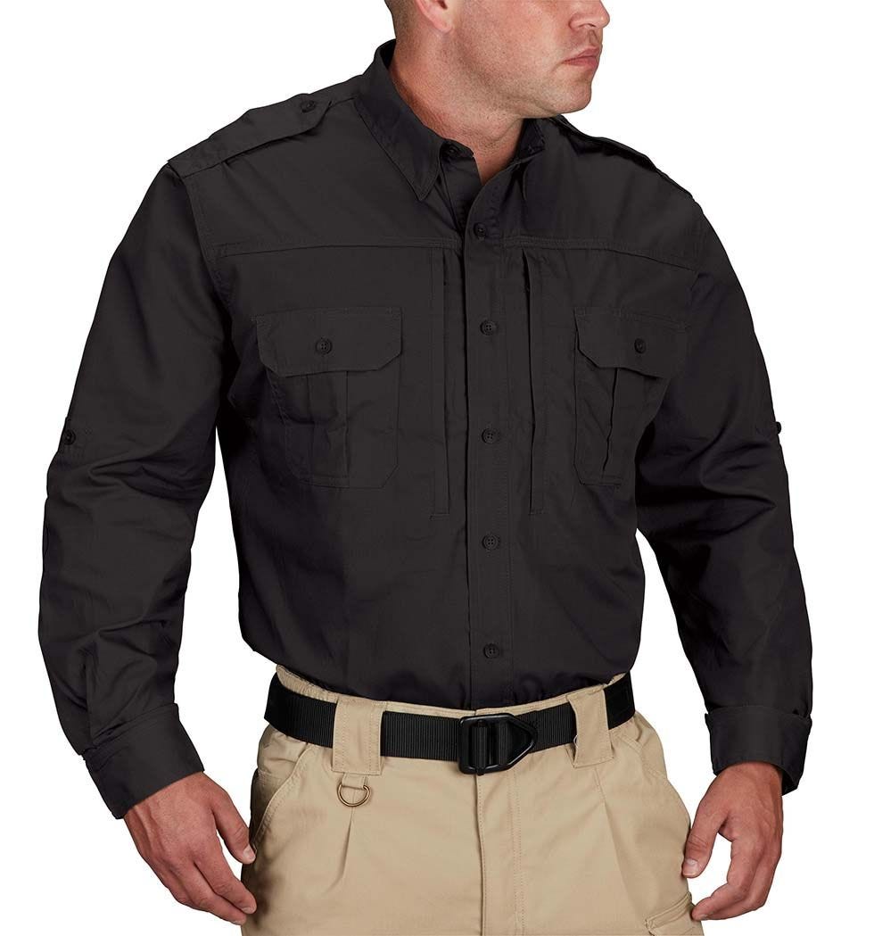 Person wearing a black long-sleeve shirt and beige pants on a white background