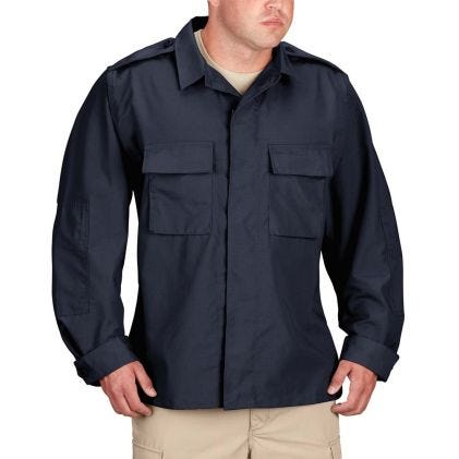 Navy blue shirt worn by a person on a white background